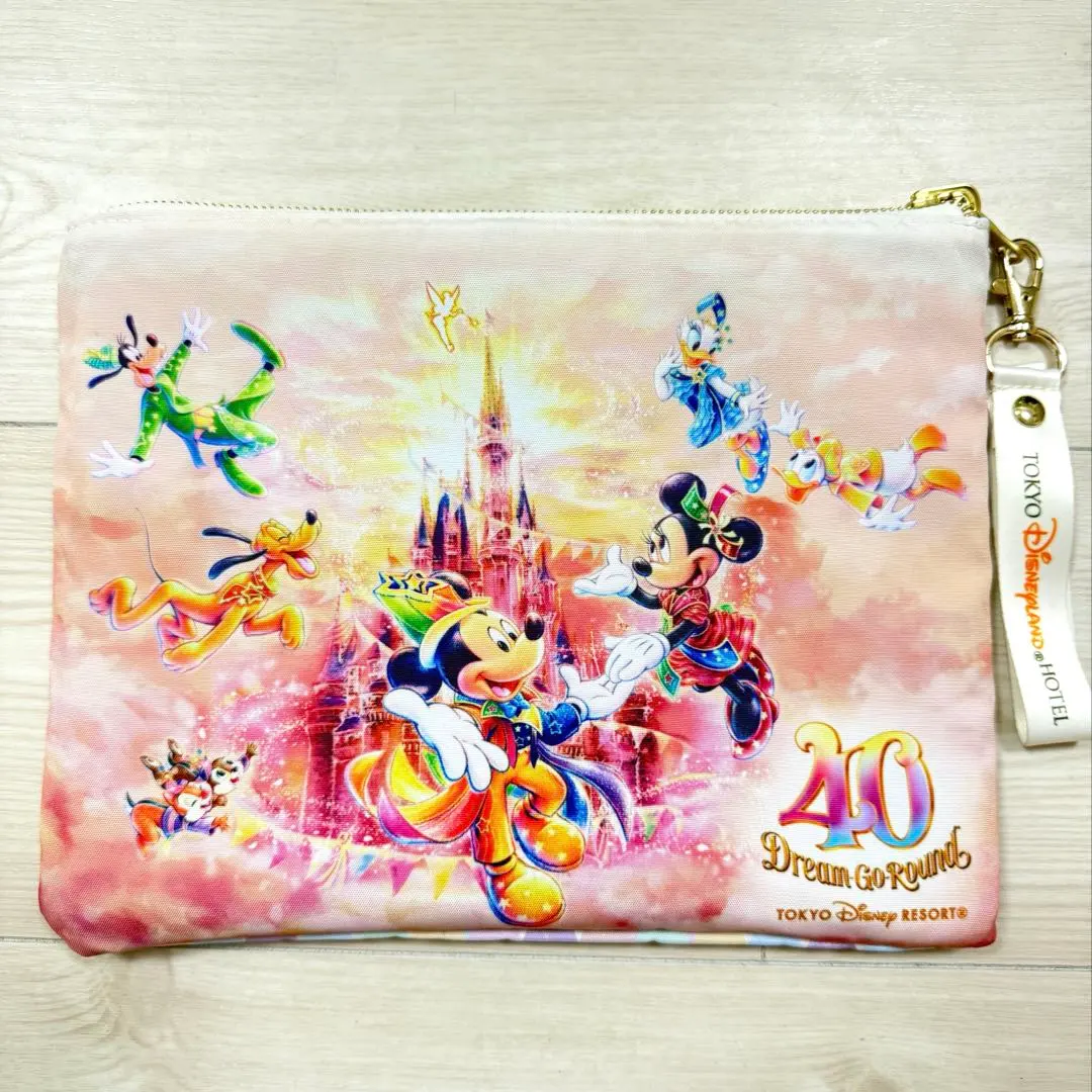 宿泊者限定！】ディズニーランド40周年記念ポーチ 公式】宿泊者特典