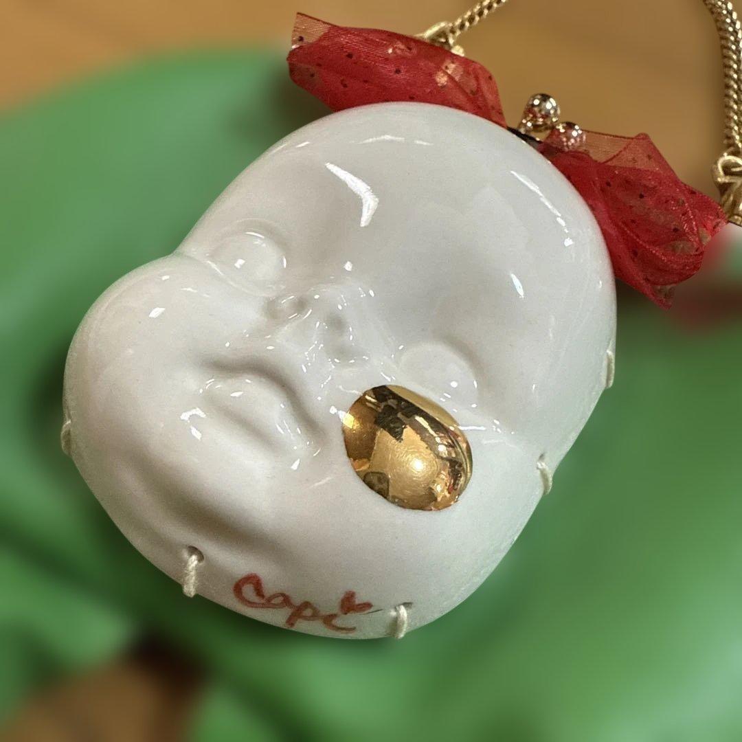 copi✖️あちゃちゅむ 陶器製 人形顔デザインの緑色がま口バッグ