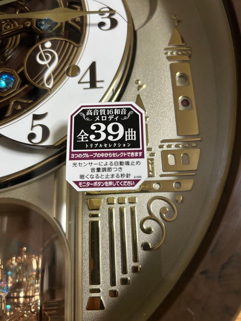 RE579B 電波時計 セイコー 掛時計 壁掛け時計　メロディ機能付き回転飾り